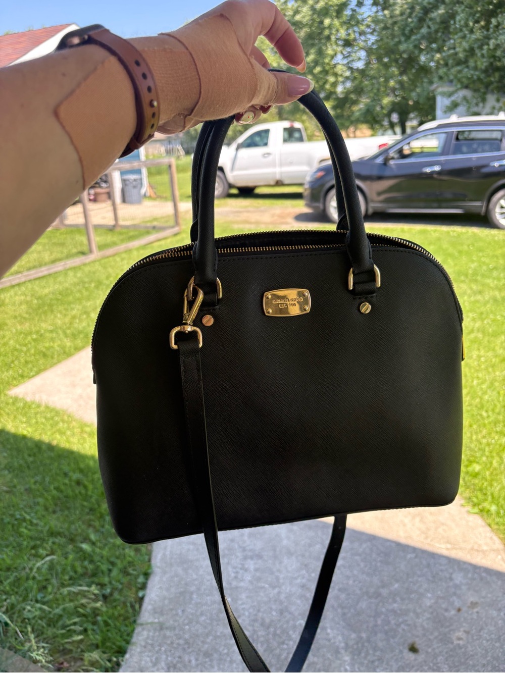 Michael Kors Black Dome Satchel with Gold Hardware